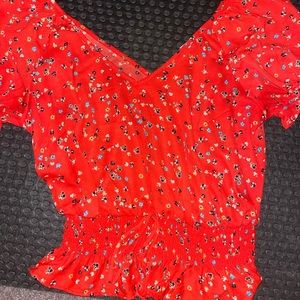 Red blouse w/ flowers